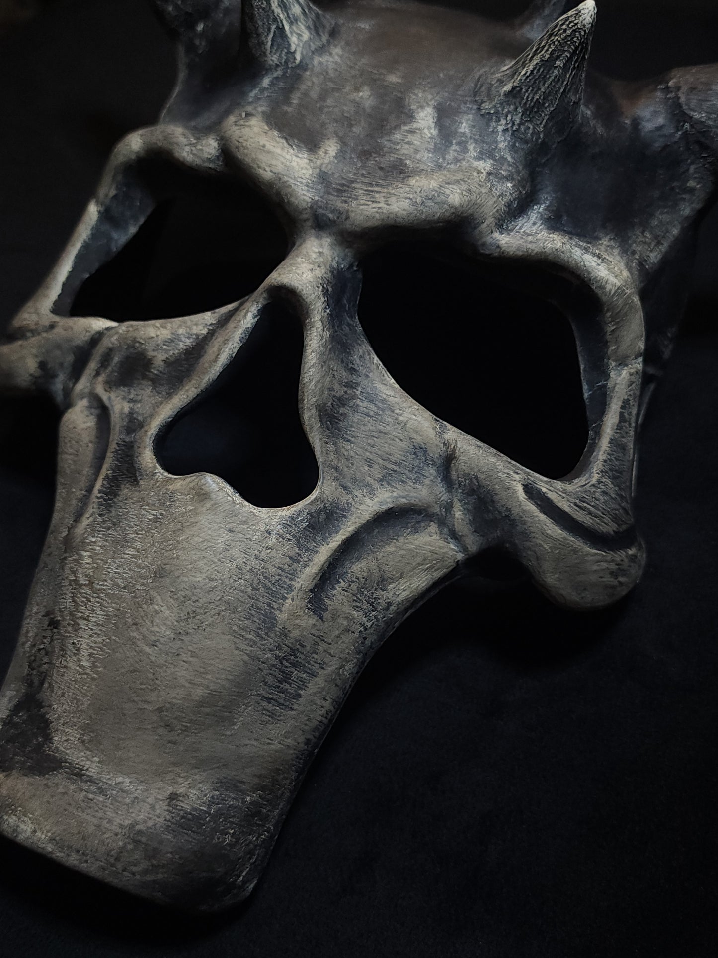 Side profile of Reaper Skull Mask showing bone texture