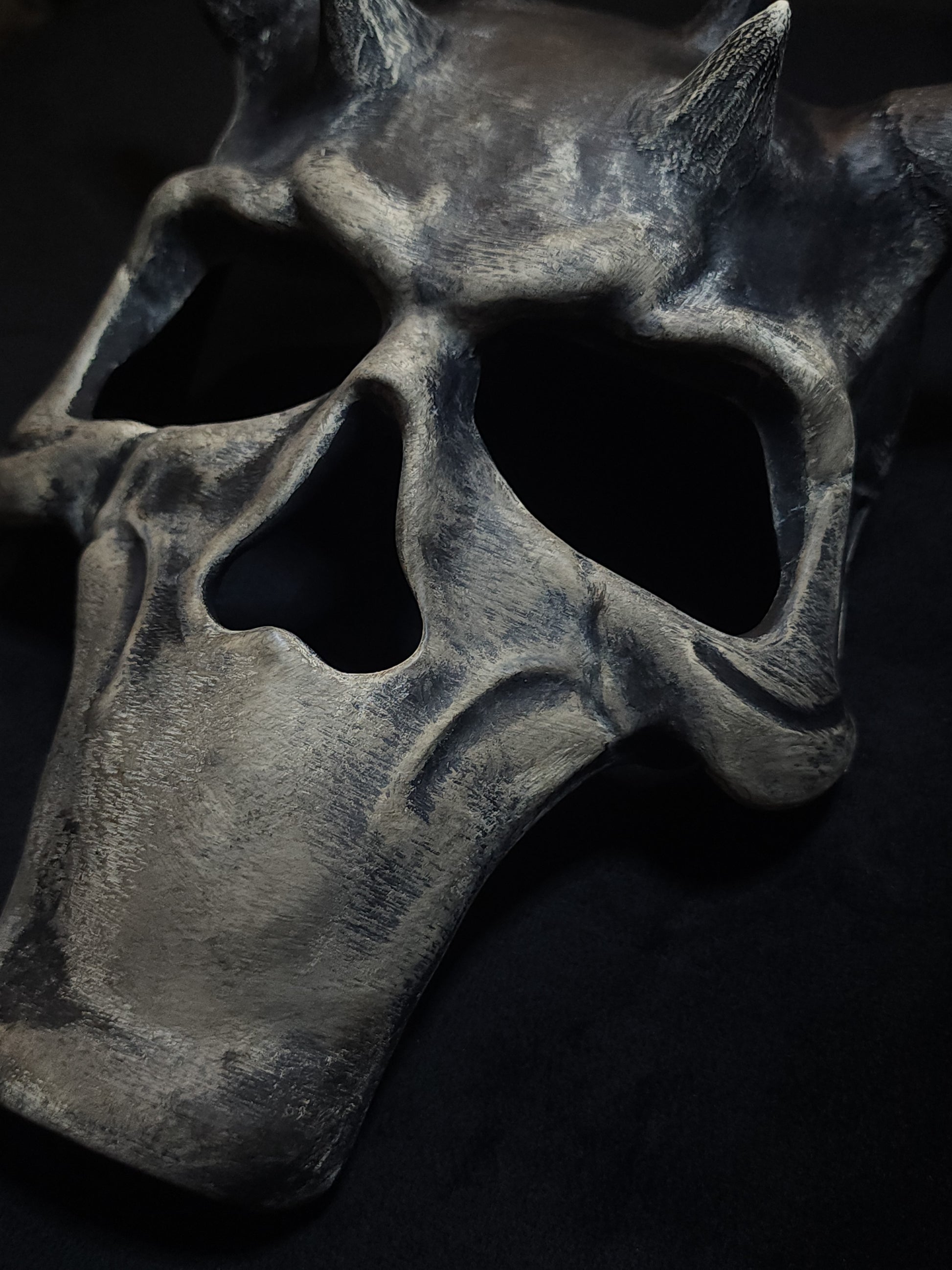 Side profile of Reaper Skull Mask showing bone texture