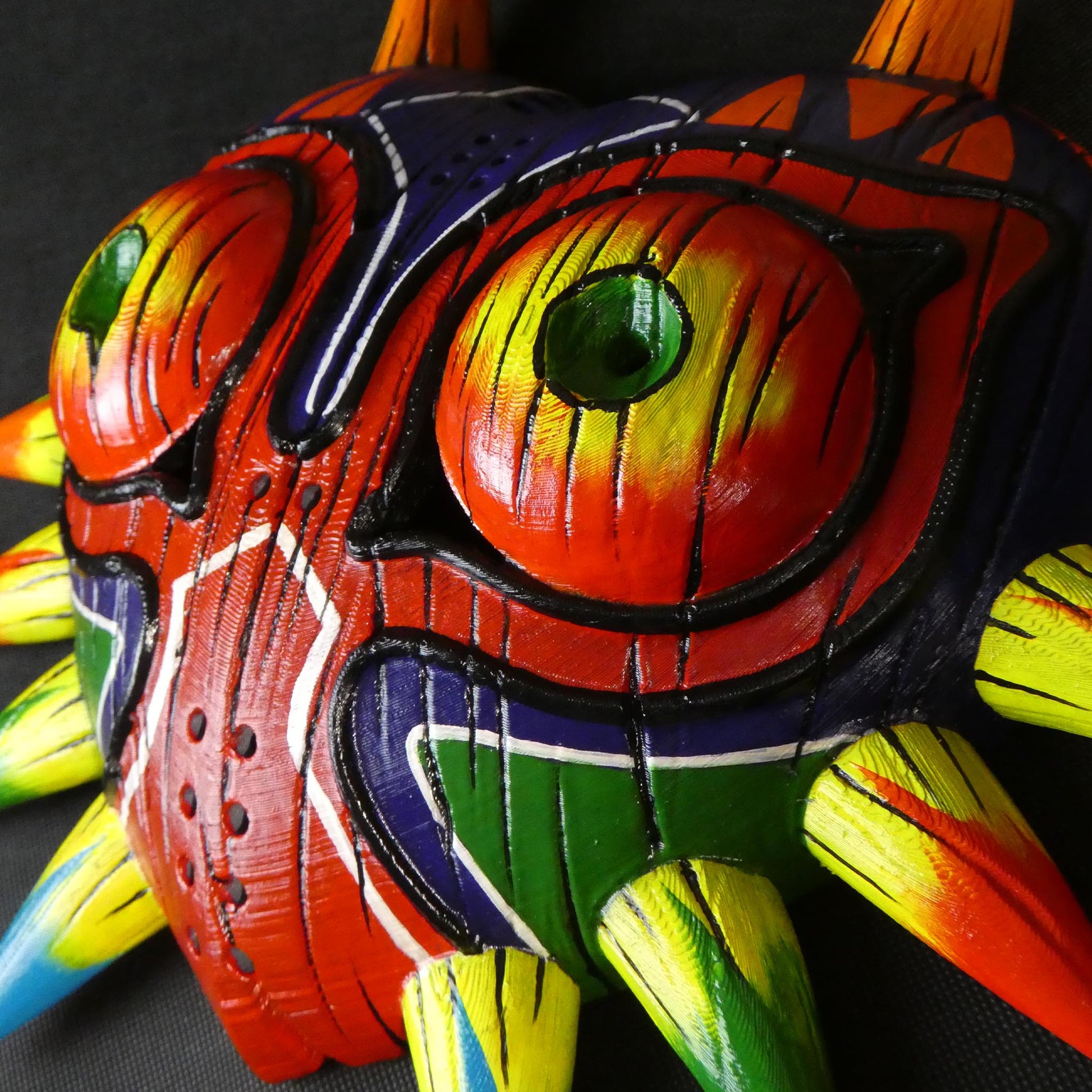 Close-up of wearable Majora’s Mask straps