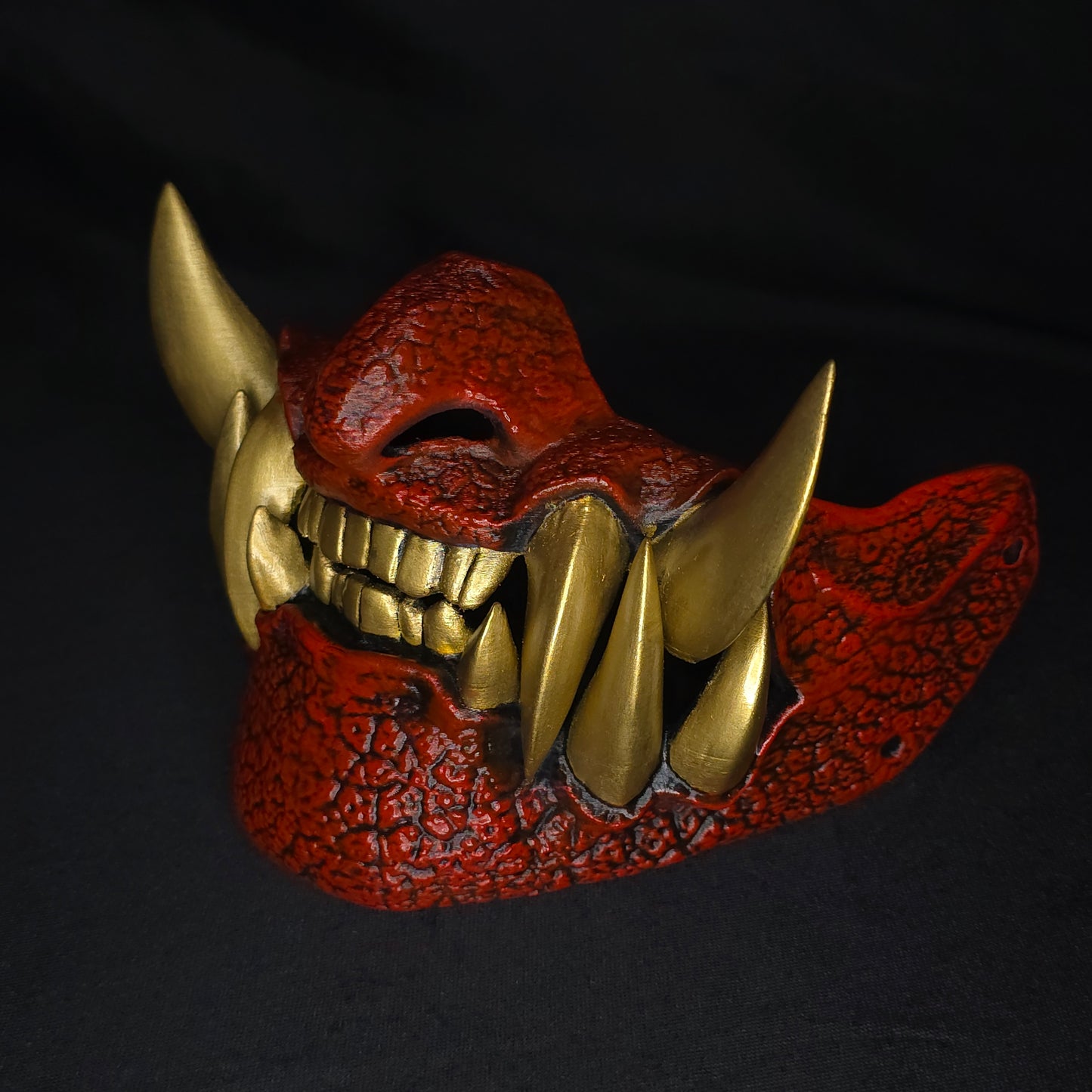 Side view of Half Oni Mask showing depth, texture, and demon facial details