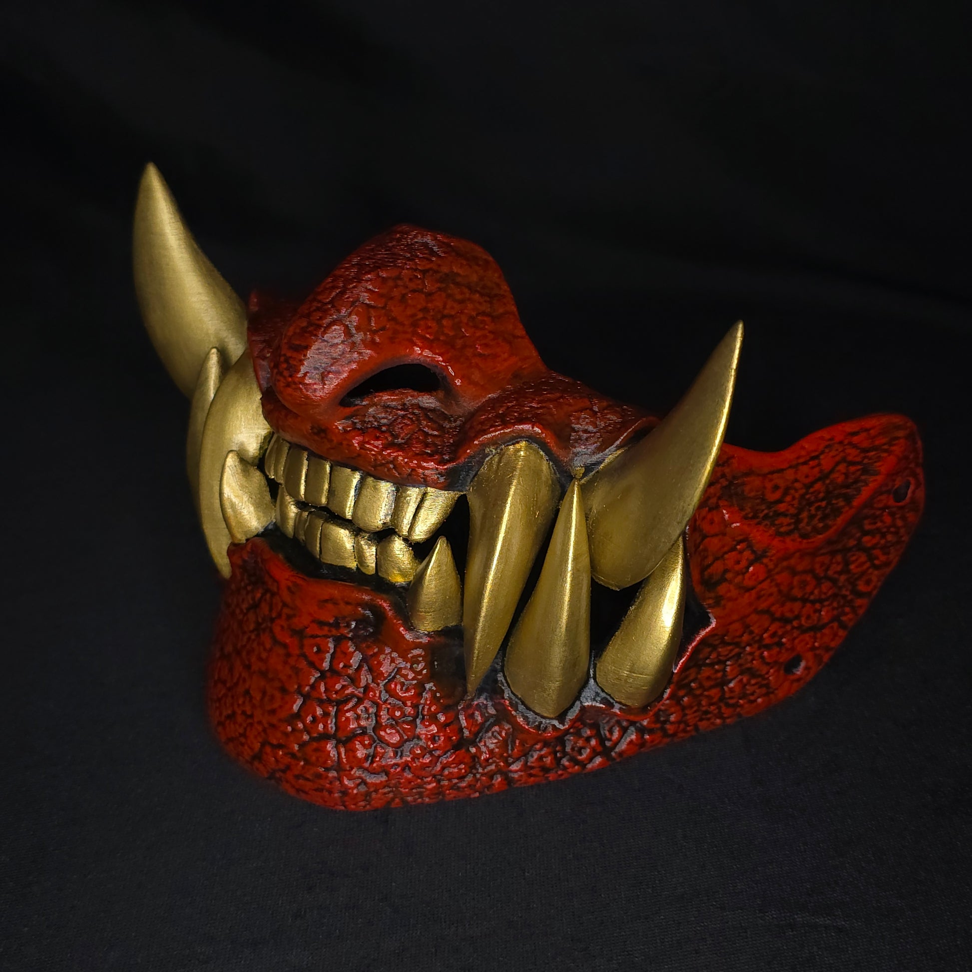 Side view of Half Oni Mask showing depth, texture, and demon facial details
