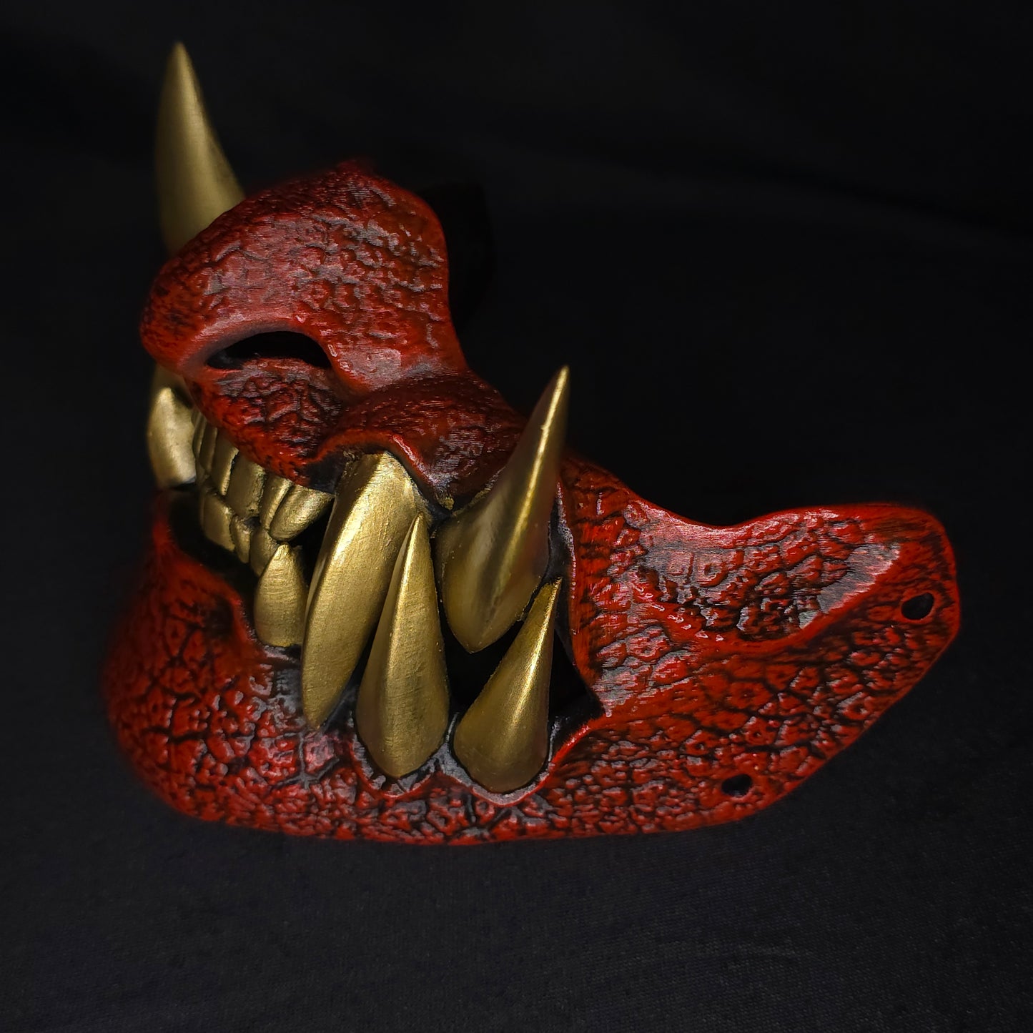 Red and Gold Half Oni Mask, traditional Japanese demon mask with detailed texture