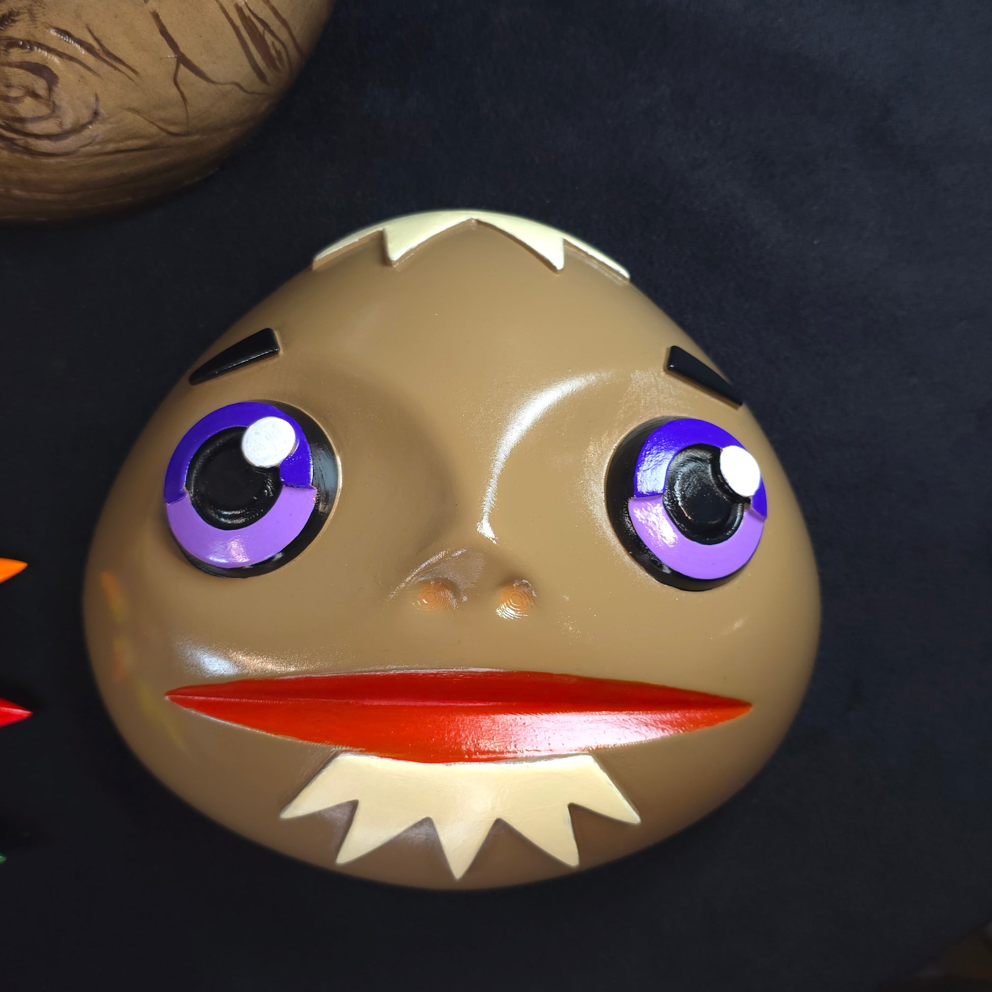 Majora's Mask art piece featuring a detailed mask of Goron